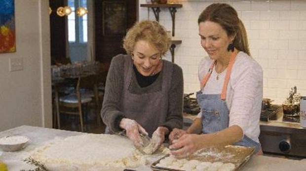 Carrie and her mom making biscuits