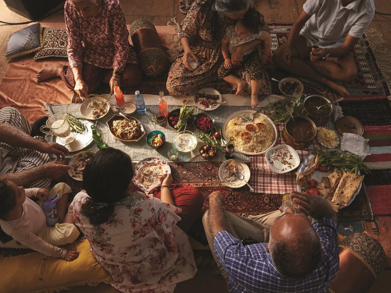 A family enjoying a meal 