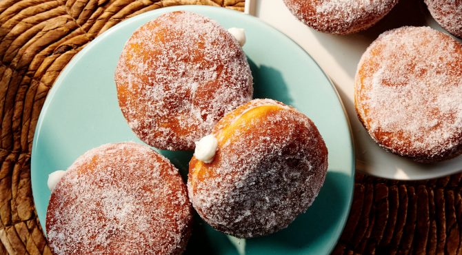 Malasadas on a blue plate
