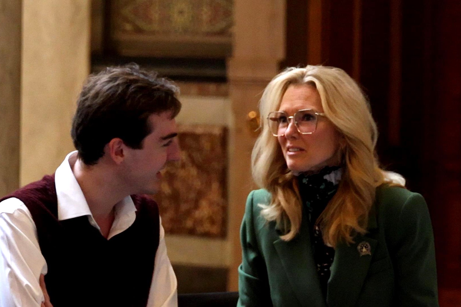 Shelli Yoder (D-Bloomington) speaks with an audience member at the Confront the Climate Crisis event March 17, 2025 at the statehouse.