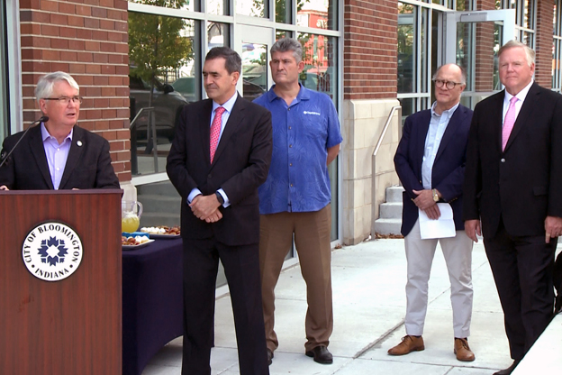 Officials mark the beginning of city-wide broadband installation where Hoosier Networks will operate their Indiana offices.