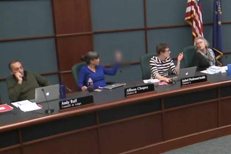 City Council Member Allison Chopra is seen making an obscene gesture during a City Council meeting, Tuesday, Oct. 22, 2019.