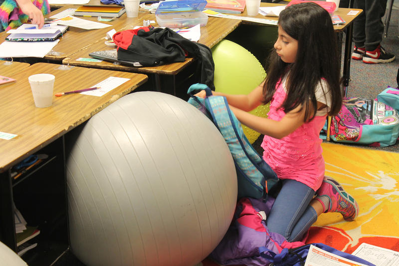 First grade students in a school classroom.