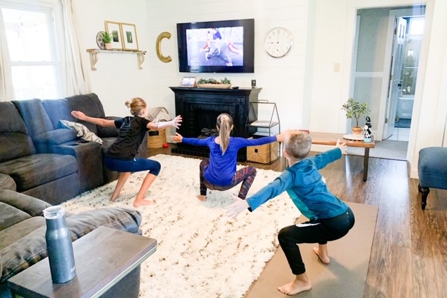 The Clampitt siblings exercising at home. 