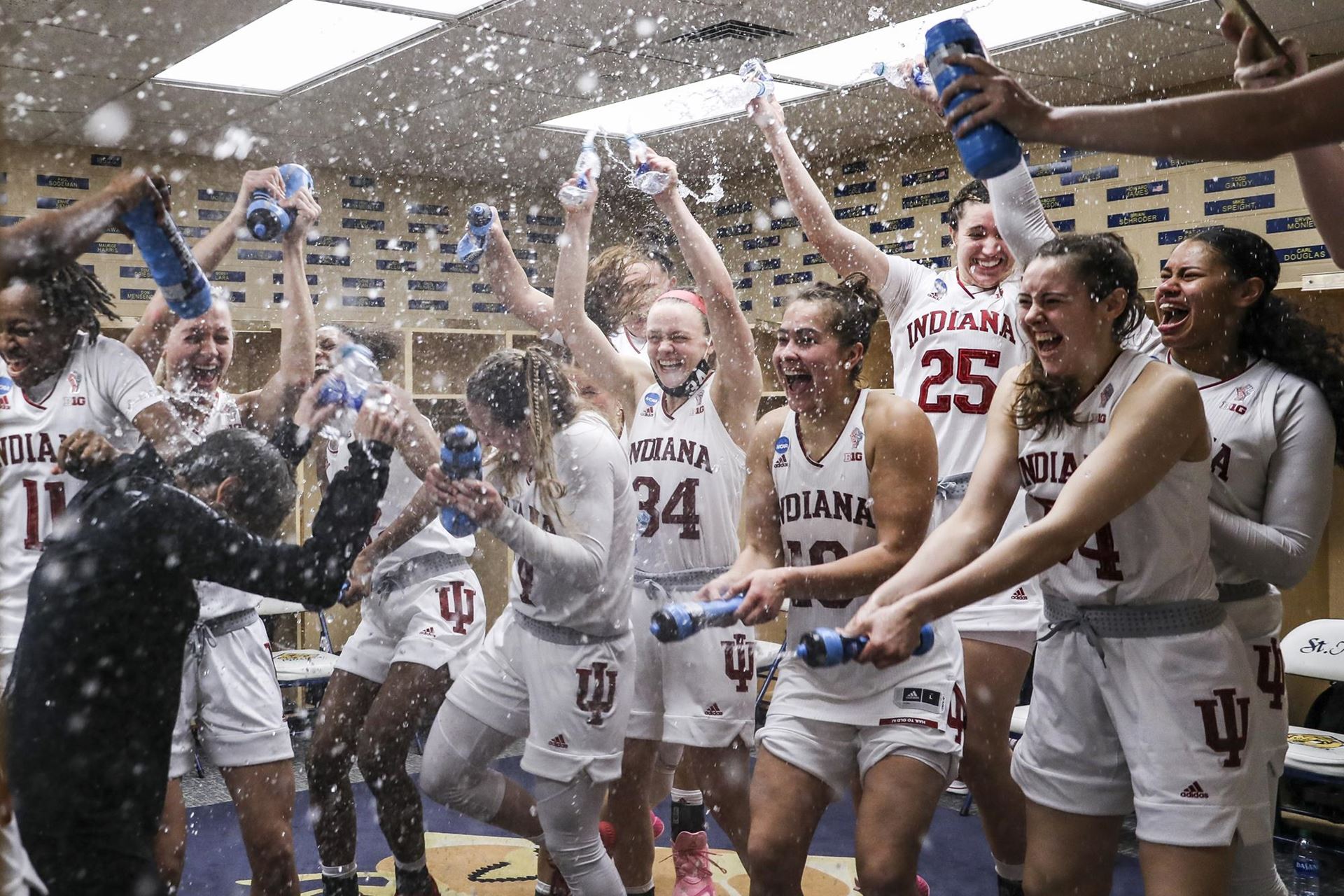 Courtesy: IU Athletics, The IU women's basketball team celebrates the program's first ever Sweet Sixteen.