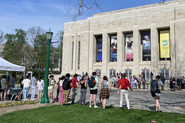 IU grad students cheer faculty exiting the IU Auditorium after the no confidence vote.