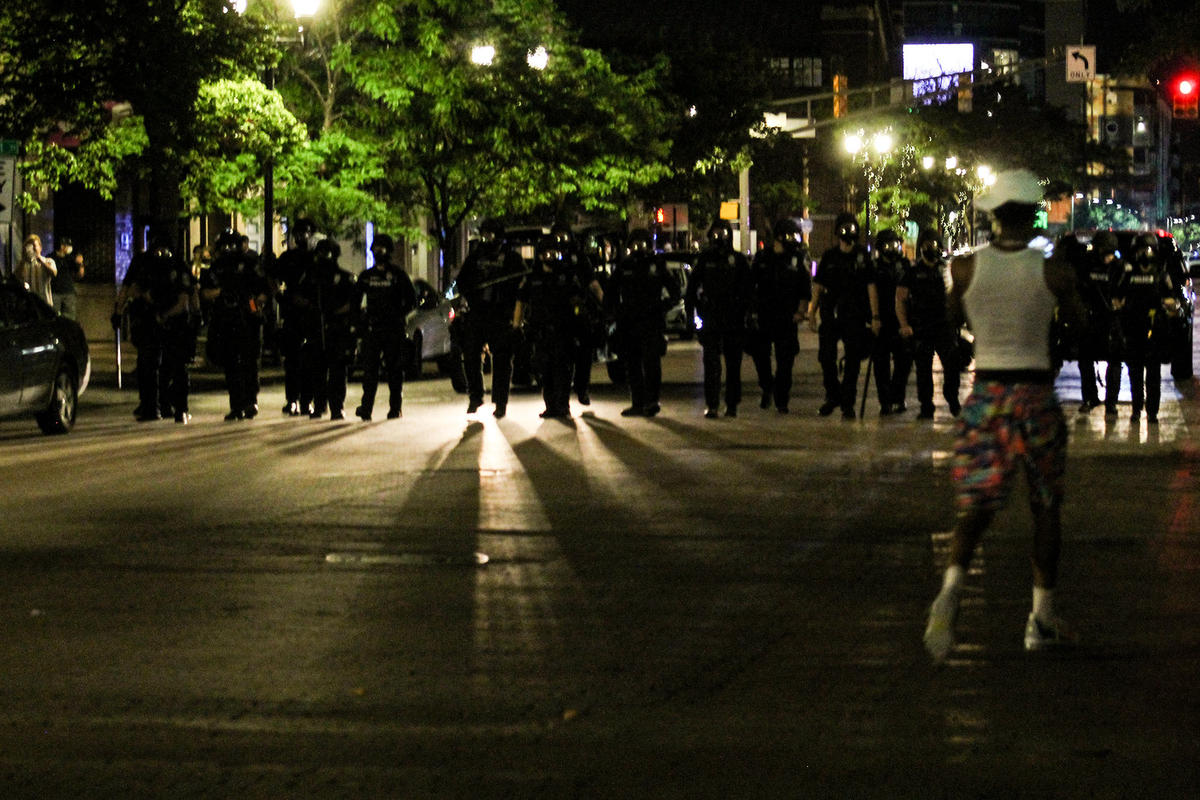 IMPD officer and protestor