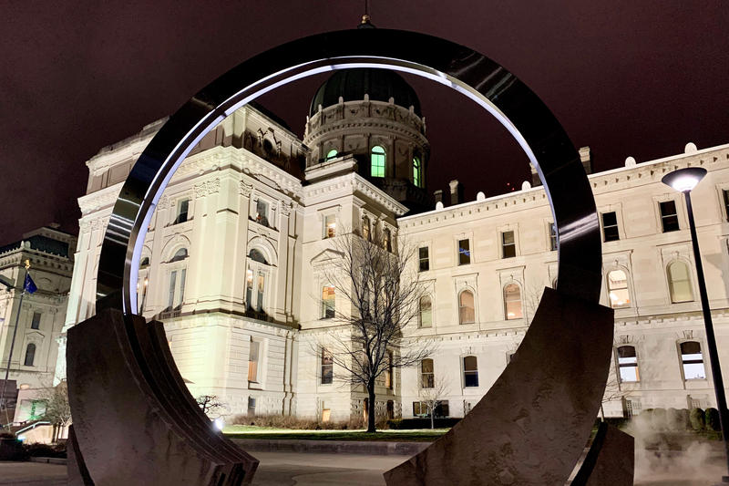 The Indiana Statehouse at night.