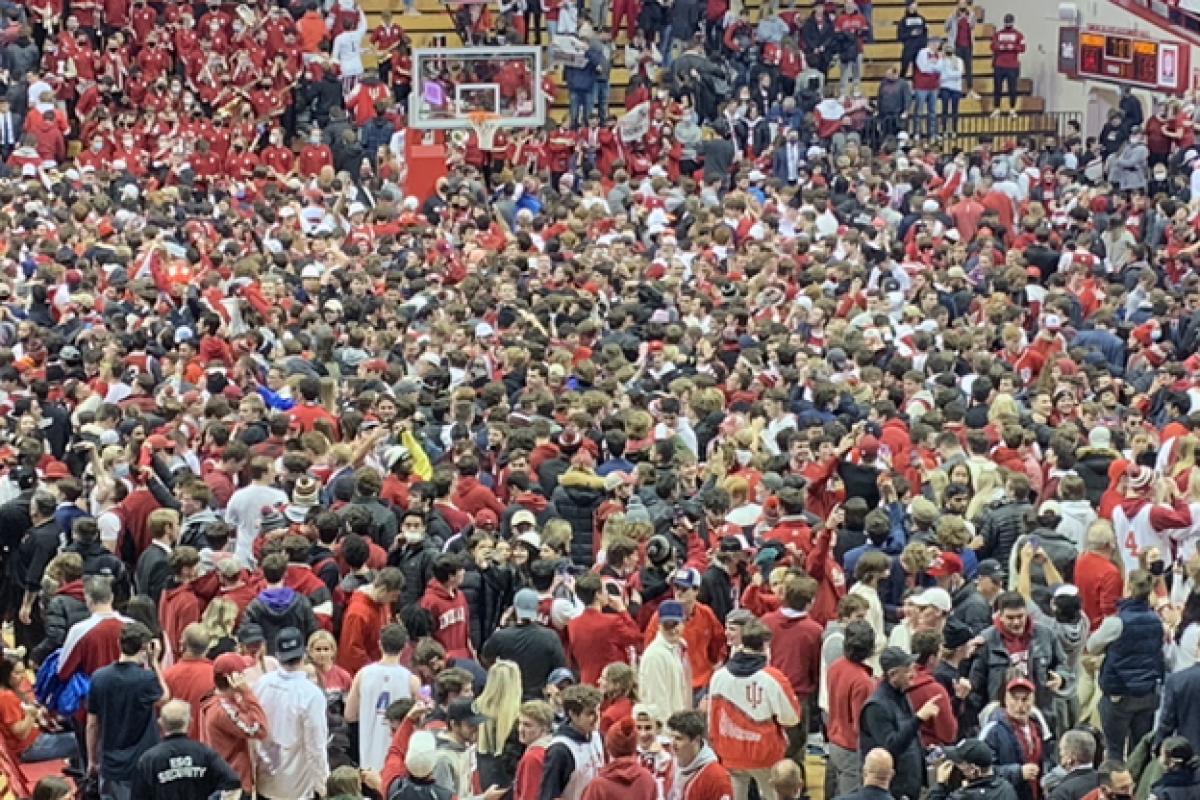 Students storm the court after IU defeats Purdue Thursday night at Assembly Hall.