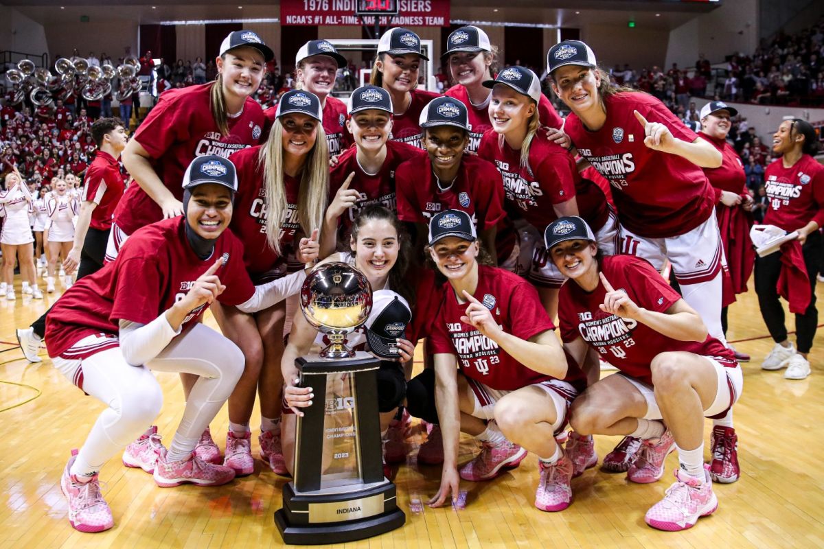 Indiana's players celebrate after clinching a share of the Big Ten title with a win over Purdue Sunday.