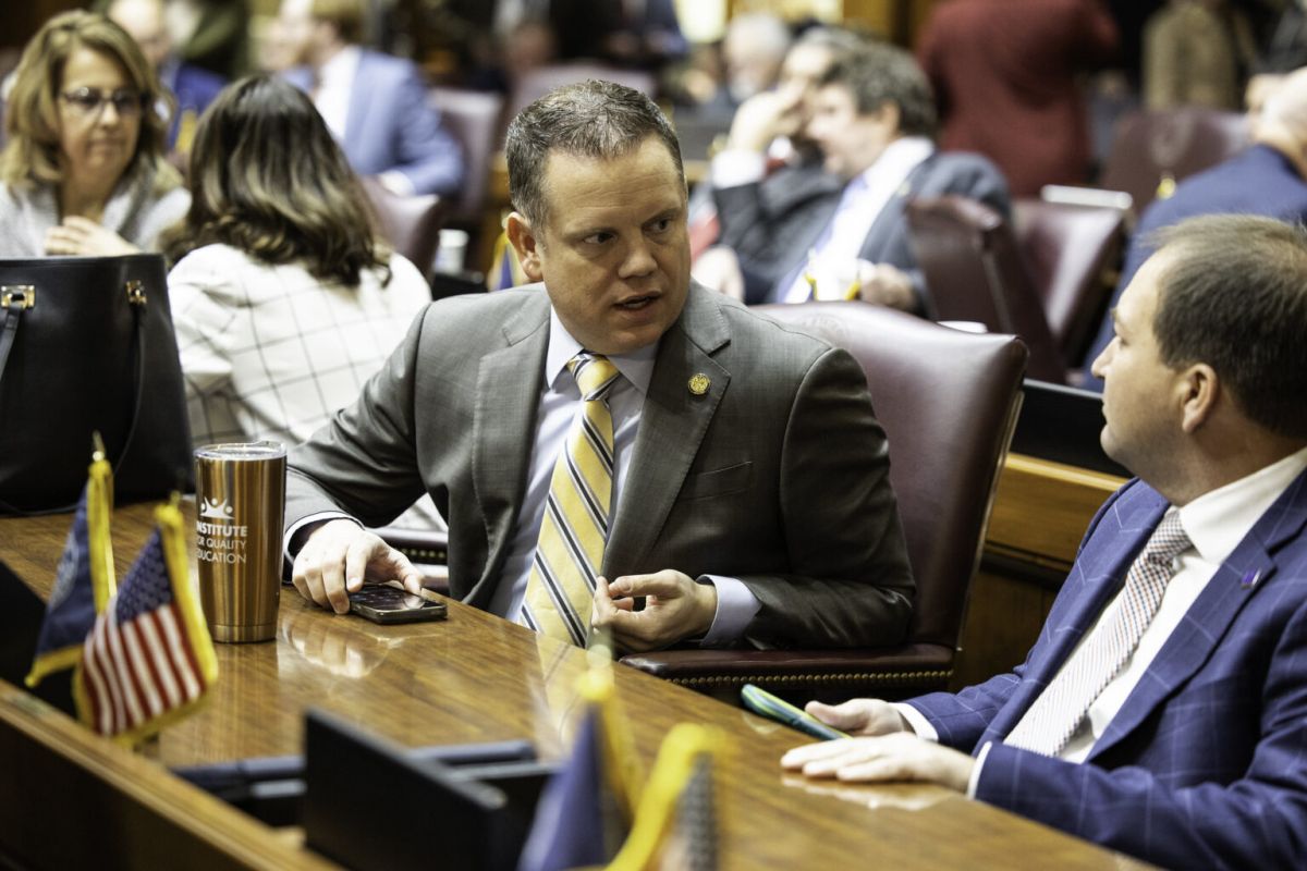 Rep. Chris Jeter declined to say whether his amendment was aimed at drag queen story times. He is shown speaking with a colleague in the House chamber on Jan. 9, 2025.