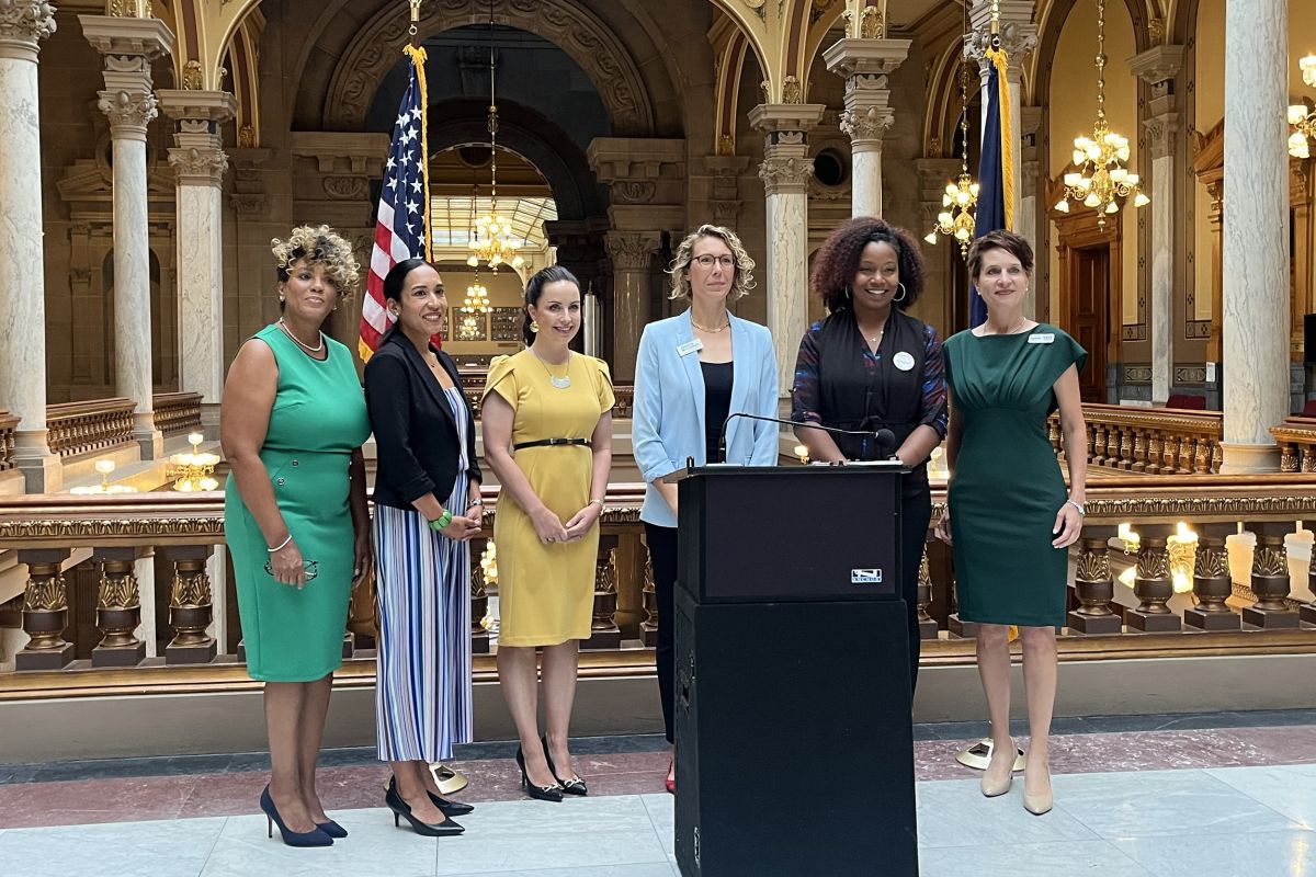 Democratic candidates and leaders pose in the Statehouse Aug 9, 2022