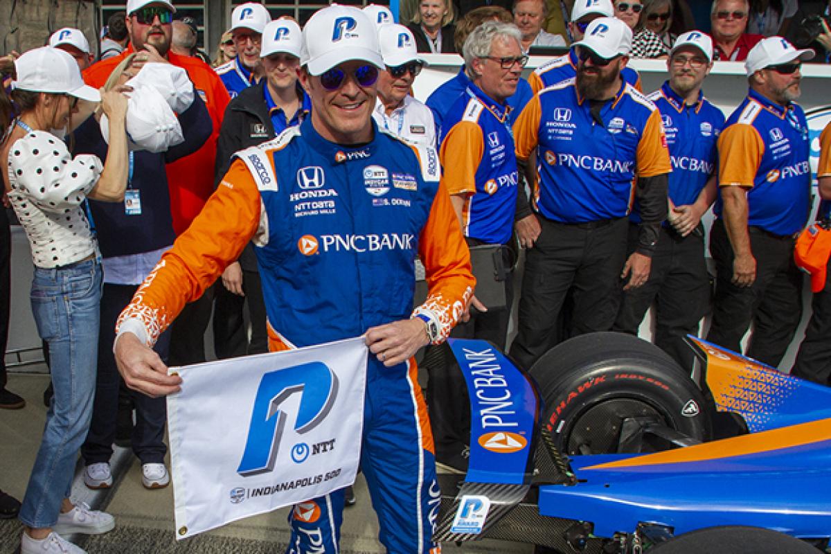 Scott Dixon celebrates winning the pole position for the Indianapolis 500 on Sunday, May 22.