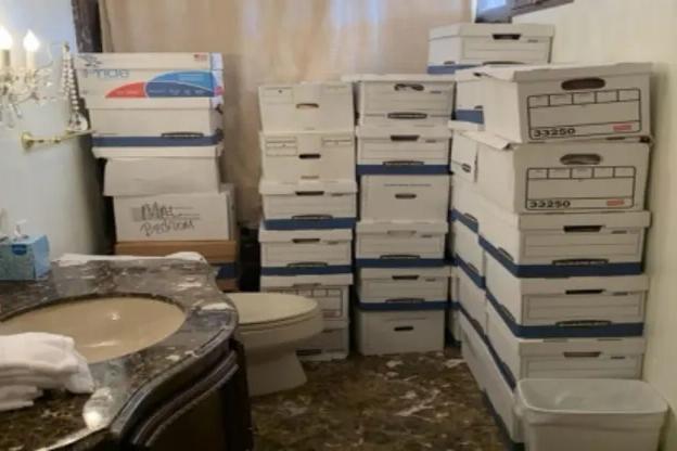 Boxes of records are shown stored in a bathroom at Donald Trump's Mar-A-Lago estate in Palm Beach, Fla. The photo was included in the indictment against the former president unsealed Friday.