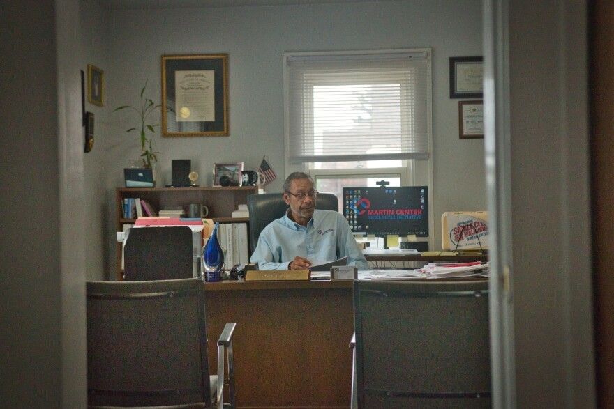 gary gibson sitting at desk