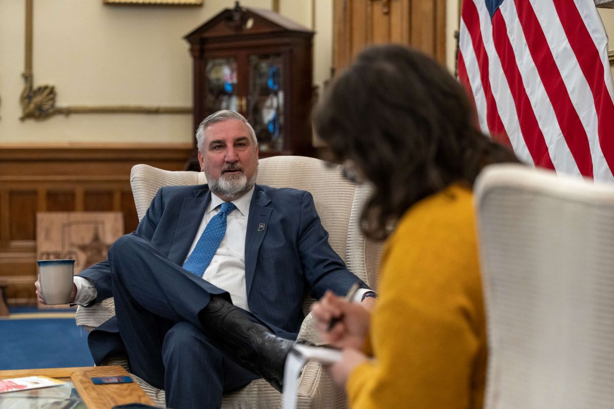 Gov. Holcomb talks with members of the media during end of the year media availability Dec. 18, 2023, in the Governor's Office.