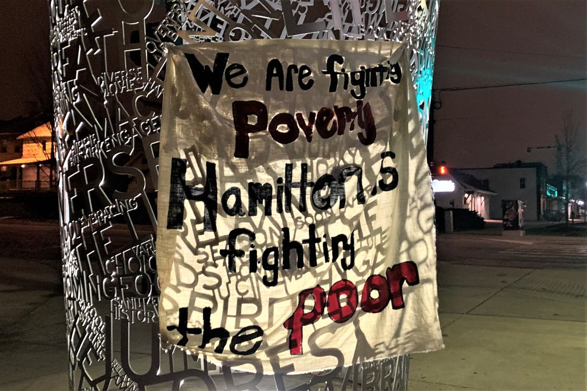 A sign protesting the scheduled eviction of unhoused individuals camping in Seminary Park, Jan. 11, 2021.