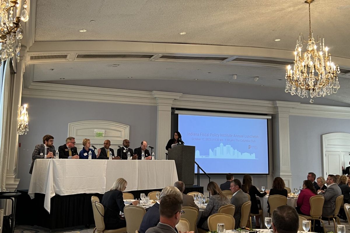 Representatives from Indiana, Purdue, Ball State and Vincennes universities, as well as Indiana State and Ivy Tech Community College, discuss higher education costs and retention plans during a panel presentation at an Indiana Fiscal Policy Institut