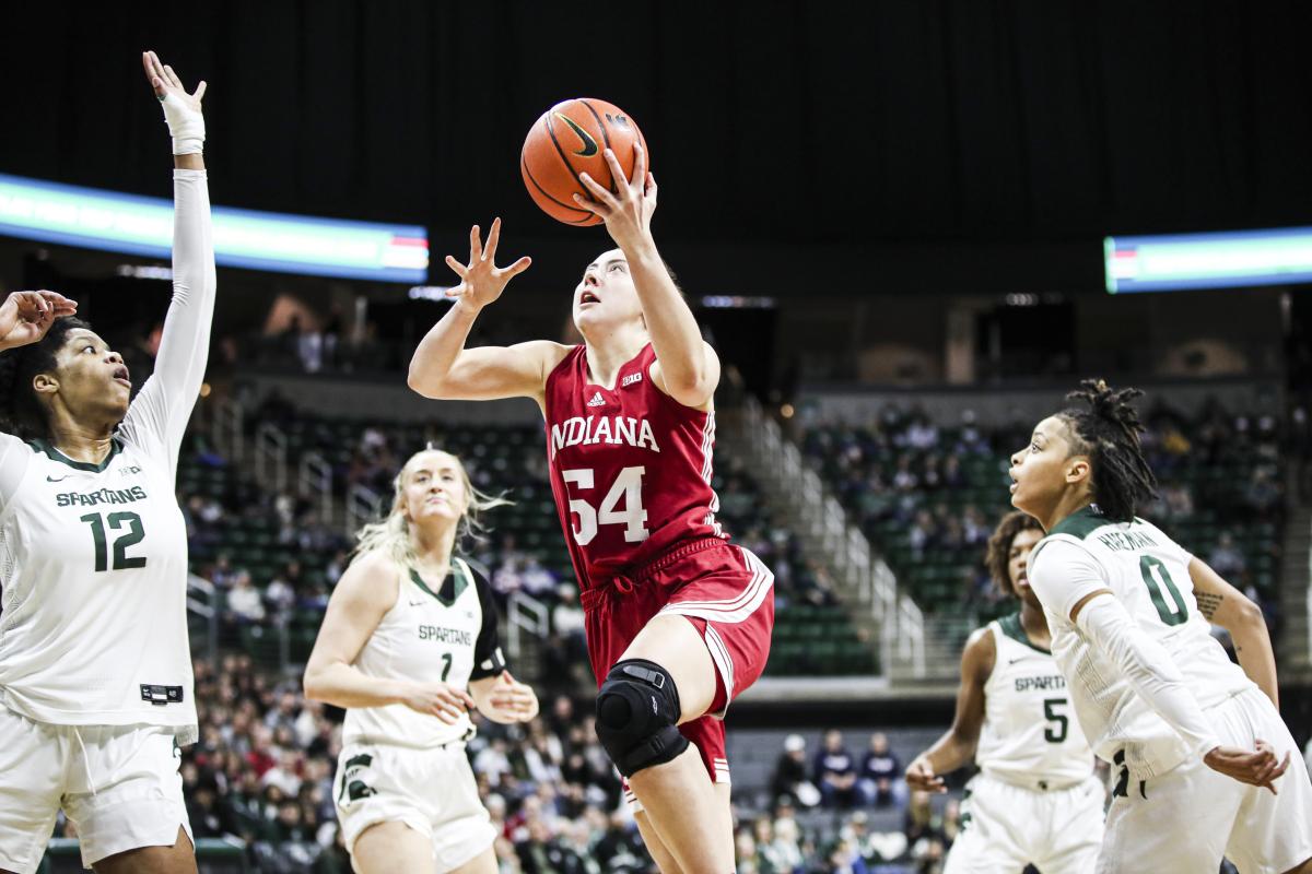 Indiana's Mackenzie Holmes drives to the basket against Michigan State Thursday.