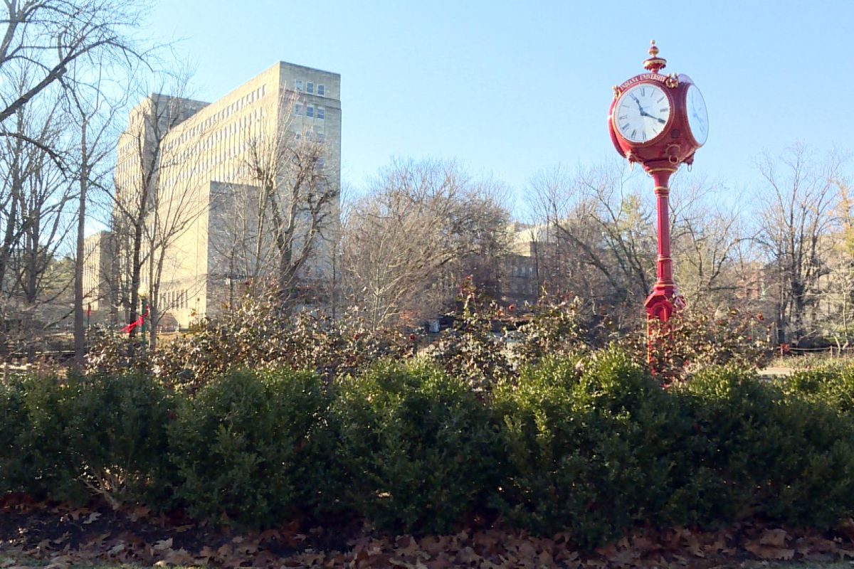 A view of the red IU clock by Ballantine Hall on the Bloomington campus of Indiana University.