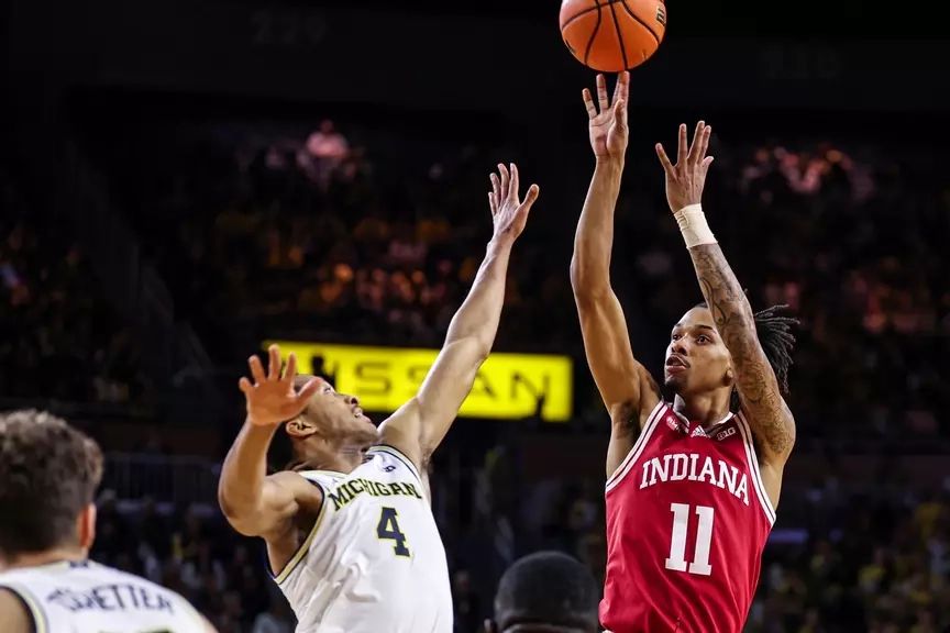 Indiana's C.J. Gunn shoots against Michigan during Tuesday night's game in Ann Arbor, Mich.