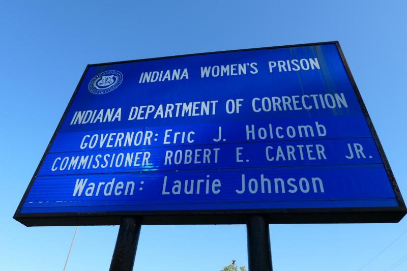 A photo of the Indiana Women's Prison sign.