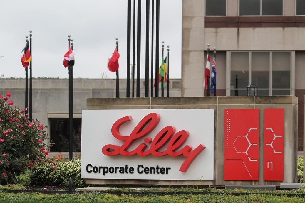 Eli Lilly headquarters sign and building in Indianapolis.