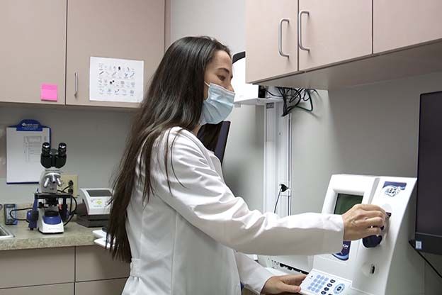 Dr. Helen Bernie testing sperm count