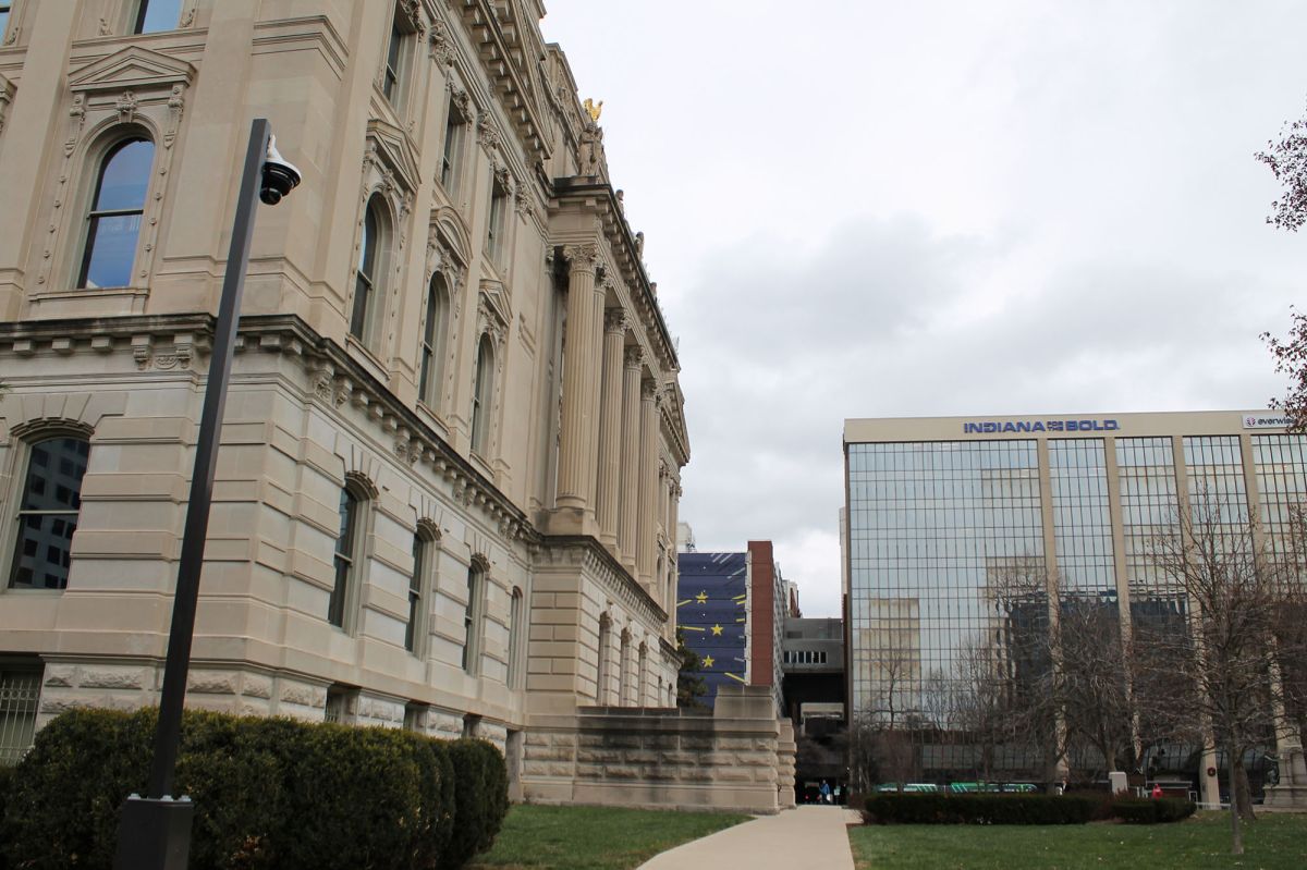 A sidewalk cuts across the south entrance of the Indiana Statehouse and leads to the Indiana Economic Development Corporation's office, directly across the street.