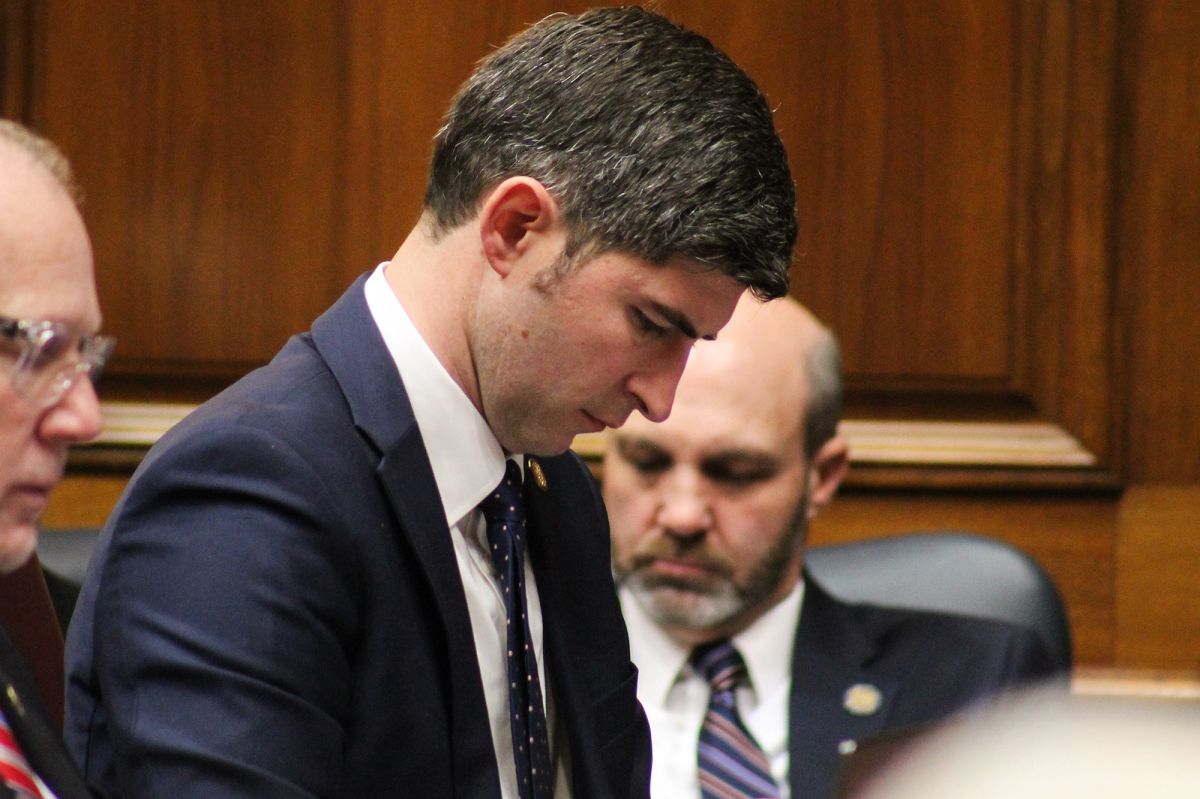 Rep. Tim Wesco (R-Osceola), a man in a suit with short brown hair, looks toward the floor in the House chamber.