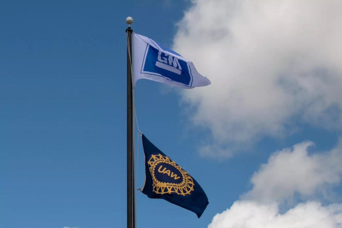 United Auto Workers and General Motors flags
