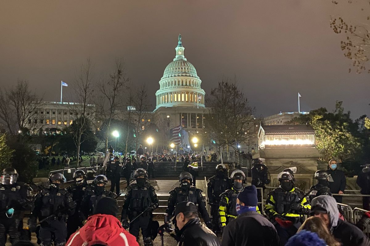 A photo of the Capitol building in Washington D.C., the night after rioters violently occupied the Capitol.
