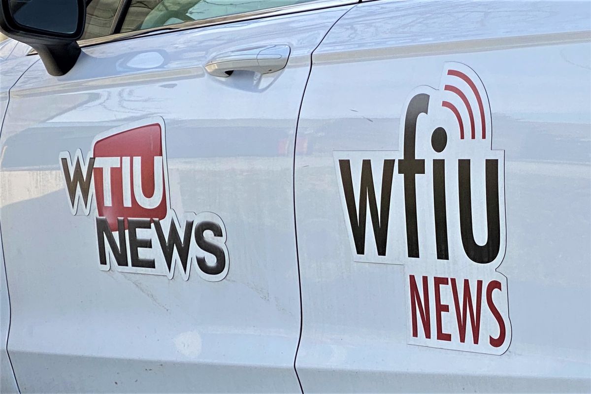 A photo of the side of the WFIU/WTIU news car.