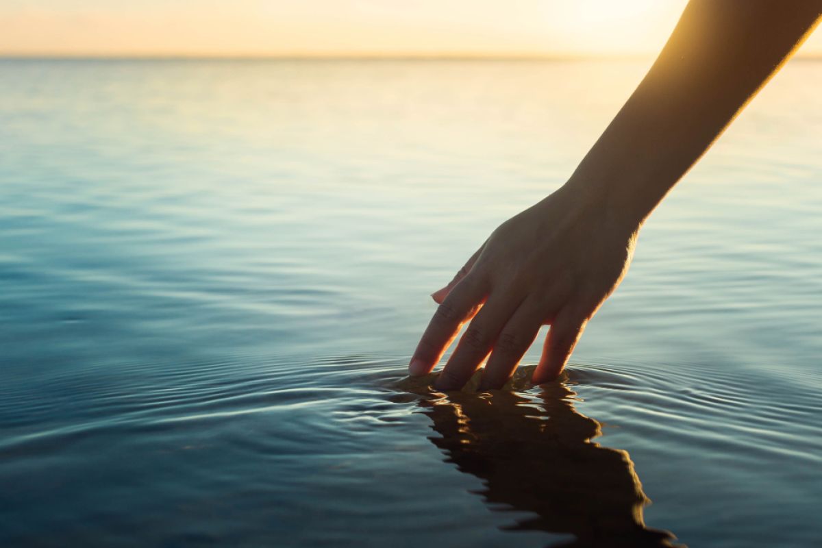 Dipping fingers in a lake