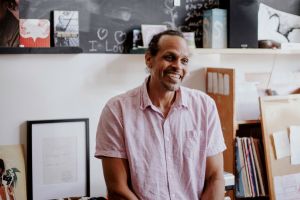 Ross Gay in a pink shirt