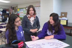 Students Emily Wang and Danielle Yang, and Bloomington South mentor and science educator Kirsten Milks 