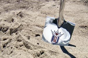 Image of a shovel with the Queen of Terre Haute Casino Resort logo on it. 