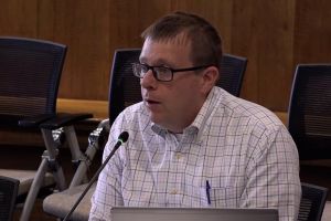 Teshka presents on SB 478 at House committee hearing