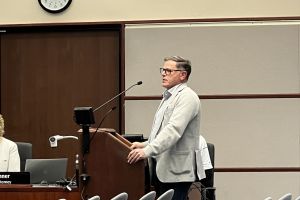 John Fernandez, former Bloomington mayor, speaks on behalf of The Mill regarding an alleyway vacation.