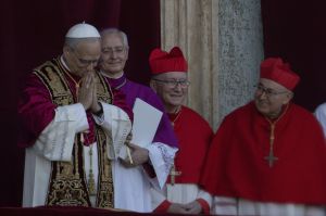 AP OK - Newly elected Pope Leo XIV, left, formerly Cardinal Robert Francis Prevost, appears (left) at the Vatican shortly after his election as the 267th pontiff of the Roman Catholic Church, Thursday, May 8, 2025.