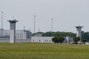OK TO USE The entrance to the federal prison in Terre Haute, Ind., is seen Wednesday, July 15, 2020.